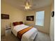Inviting bedroom with queen-sized bed, soft lighting, and a relaxing ambiance at 2633 Spider Cactus Ct, Las Vegas, NV 89106