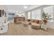 Spacious living room featuring contemporary furnishings, ample natural light, and an open floor plan at 2633 Spider Cactus Ct, Las Vegas, NV 89106