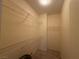 Spacious walk-in closet with custom shelving and ample storage space for clothing and accessories at 2633 Spider Cactus Ct, Las Vegas, NV 89106