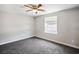 Well-lit bedroom features neutral walls, carpeted floor, and bright window at 280 Gentry St, Overton, NV 89040
