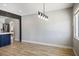 Open concept dining area with views into the kitchen and abundant natural light at 280 Gentry St, Overton, NV 89040