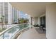 Balcony with glass railings, outdoor seating and tropical views at 2857 Paradise Rd # 401, Las Vegas, NV 89109