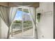 Enjoy city views from this balcony with sheer curtains and decorative plant accents at 2857 Paradise Rd # 401, Las Vegas, NV 89109