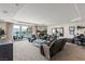Bright living room featuring plush seating, fireplace, balcony, and neutral tones at 2857 Paradise Rd # 401, Las Vegas, NV 89109