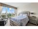 Comfortable bedroom with city views featuring plush bed, large window, and stylish décor at 2857 Paradise Rd # 401, Las Vegas, NV 89109
