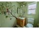 Bathroom with artistic painted mural, single sink vanity, and standard toilet at 2906 Cedar Ave, Las Vegas, NV 89101