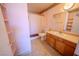 Bathroom featuring a shower and tub combo, single sink vanity, and tile flooring at 2906 Cedar Ave, Las Vegas, NV 89101