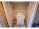 A compact laundry area featuring a white washing machine in a tiled space at 2906 Cedar Ave, Las Vegas, NV 89101