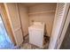 A compact laundry area featuring a white washing machine in a tiled space at 2906 Cedar Ave, Las Vegas, NV 89101