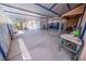 Spacious covered patio area with open walls, offering shade and outdoor relaxation with a hammock at 2906 Cedar Ave, Las Vegas, NV 89101