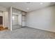 Cozy bedroom featuring plush carpeting and a mirrored closet, creating a bright and spacious feel at 3386 El Camino Real, Las Vegas, NV 89121