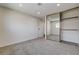 Neutral bedroom with soft carpet, recessed lights and closet with mirrored doors at 3386 El Camino Real, Las Vegas, NV 89121