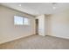 This carpeted bedroom features a window, closet and white trim and walls at 3386 El Camino Real, Las Vegas, NV 89121