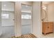Hallway featuring carpet and hardwood flooring and direct access to bedrooms and bathrooms at 3386 El Camino Real, Las Vegas, NV 89121