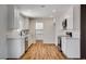 Bright, newly remodeled kitchen featuring white cabinets, marble countertops, and stainless steel appliances at 3386 El Camino Real, Las Vegas, NV 89121