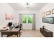 Bright and airy office features a modern desk setup and a large window at 3395 Stone View Ave, Henderson, NV 89044