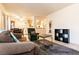 Comfortable living area with open access to the dining area and kitchen at 3890 Lancome St, Las Vegas, NV 89115