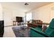 Living room featuring a comfortable couch, chairs, and a shag rug at 3890 Lancome St, Las Vegas, NV 89115