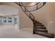 Spacious foyer with a curved staircase and open floor plan, perfect for entertaining at 3892 Pasilla Ave, Las Vegas, NV 89118