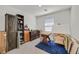 Bedroom with furniture that includes easel and large artist workspace at 392 Canary Song Dr, Henderson, NV 89011