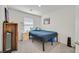 Bedroom with neutral carpet, single bed, small end table and closet at 392 Canary Song Dr, Henderson, NV 89011