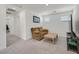 Cozy living room with comfortable seating, television, and adjacent doorway at 392 Canary Song Dr, Henderson, NV 89011