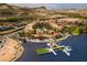 Picturesque community with Mediterranean-style architecture, lake, and boat docks at 40 Heron Harbour Dr, Henderson, NV 89011