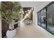Bright, open dining room features modern light fixtures, high ceilings, and a view of the outdoor landscape at 40 Heron Harbour Dr, Henderson, NV 89011