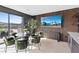 Bright living area with modern decor, dining table, and stunning views at 40 Heron Harbour Dr, Henderson, NV 89011