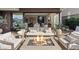 The stylish outdoor patio is perfect for relaxation, featuring a modern fire pit and views to the spacious interior at 40 Heron Harbour Dr, Henderson, NV 89011