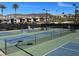Community tennis courts with mountain views and well-maintained landscaping at 40 Heron Harbour Dr, Henderson, NV 89011