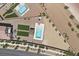 Aerial shot of backyard showing pool, artificial turf, and landscaping in a well-maintained yard at 4030 Midnight Crest Ave, North Las Vegas, NV 89031