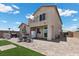 Spacious backyard with patio, dining set, grill, and low-maintenance landscaping at 4030 Midnight Crest Ave, North Las Vegas, NV 89031
