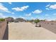 Expansive backyard with potential for landscaping, featuring a pool, and a block wall at 4030 Midnight Crest Ave, North Las Vegas, NV 89031