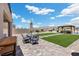 Private backyard offers space for dining, relaxing, and enjoying the outdoor space at 4030 Midnight Crest Ave, North Las Vegas, NV 89031
