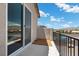 A balcony featuring views of the neighborhood and mountains beyond at 4030 Midnight Crest Ave, North Las Vegas, NV 89031