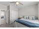 Neutral bedroom featuring a ceiling fan and a closet at 4030 Midnight Crest Ave, North Las Vegas, NV 89031