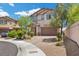 Charming two story home with a brick driveway and well maintained landscaping at 4030 Midnight Crest Ave, North Las Vegas, NV 89031