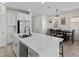 Spacious kitchen with a large island, stainless steel appliances, and an eat-in dining area at 4030 Midnight Crest Ave, North Las Vegas, NV 89031
