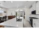 Open kitchen concept with a large island and a view into the living room at 4030 Midnight Crest Ave, North Las Vegas, NV 89031