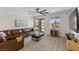 Bright living room featuring hardwood floors and access to an outdoor patio at 4030 Midnight Crest Ave, North Las Vegas, NV 89031
