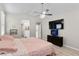 Neutral main bedroom featuring a ceiling fan and ensuite bathroom at 4030 Midnight Crest Ave, North Las Vegas, NV 89031