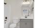 Updated bathroom with gray vanity, new fixtures, and tub at 417 N Lamb Blvd # E, Las Vegas, NV 89110