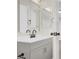 Bathroom featuring a gray vanity with marble countertops and new light fixtures and hardware at 417 N Lamb Blvd # E, Las Vegas, NV 89110