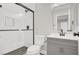 Updated bathroom with subway tile shower, matte black fixtures, and a modern vanity at 417 N Lamb Blvd # E, Las Vegas, NV 89110