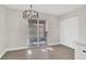 Dining room with modern lighting and vinyl flooring at 417 N Lamb Blvd # E, Las Vegas, NV 89110