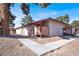 Charming exterior of a multi-Gathering home with mature trees and well-maintained landscaping at 417 N Lamb Blvd # E, Las Vegas, NV 89110