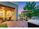 Outdoor patio and barbecue, perfect for entertaining friends, with lush greenery at 4286 Pacifico Ln, Las Vegas, NV 89135