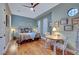 A comfortable bedroom space includes hardwood floors and a sitting area at 4286 Pacifico Ln, Las Vegas, NV 89135