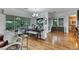 Bright dining area featuring a chandelier and large windows with views of the greenery outside at 4286 Pacifico Ln, Las Vegas, NV 89135